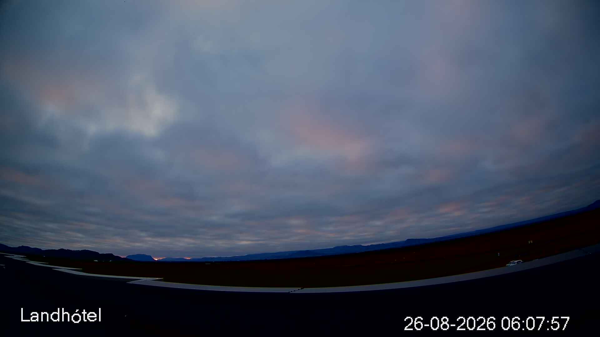 Live view from Landhotel camera 1, looking across the South Iceland plains towards distant mountains